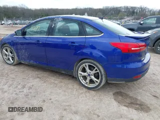 2015 Ford Focus Titanium with VIN 1FADP3J27FL298882, listed as a IAAI auction lot 42117247 with 124,185 mi miles and . Bid and sale history available at carsss.com. Image 3.
