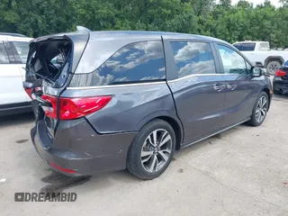 2022 Honda Odyssey Touring with VIN 5FNRL6H89NB008814, listed as a IAAI auction lot 42597738 with 49,933 mi miles and . Bid and sale history available at DreamBid. Image 4.