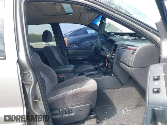 2000 Jeep Grand Cherokee Laredo with VIN 1J4GW48N5YC322707, listed as a IAAI auction lot 42080677 with Not provided miles and . Bid and sale history available at DreamBid. Image 5.
