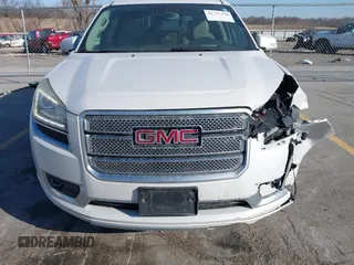 2016 GMC Acadia Denali with VIN 1GKKVTKD3GJ221449, listed as a IAAI auction lot 41777230 with 157,699 mi miles and . Bid and sale history available at DreamBid. Image 6.
