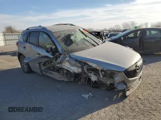 2014 Mazda CX-5 Touring with VIN JM3KE4CY1E0426409, listed as a Copart auction lot 84185294 with 0 mi miles and Salvage Title. Bid and sale history available at carsss.com. Image 4.