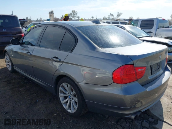 2011 BMW 3 Series 328i with VIN WBAPH5G55BNM71702, listed as a IAAI auction lot 42013598 with 192,744 mi miles. Bid and sale history available at carsss.com. Image 3.