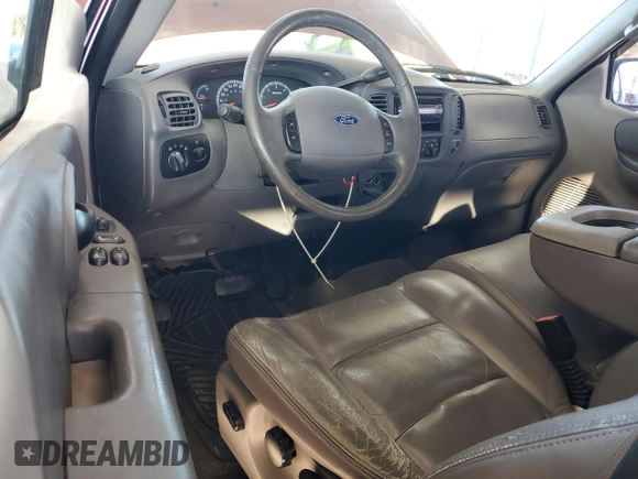 2003 Ford F-150 XL with VIN 1FTRX07L33KB73992, listed as a Copart auction lot 79565774 with 160,545 mi miles and Salvage title. Bid and sale history available at DreamBid. Image 8.