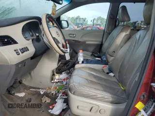2011 Toyota Sienna XLE with VIN 5TDDK3DCXBS024257, listed as a Copart auction lot 60667145 with 283,609 mi miles and Salvage title. Bid and sale history available at DreamBid. Image 7.