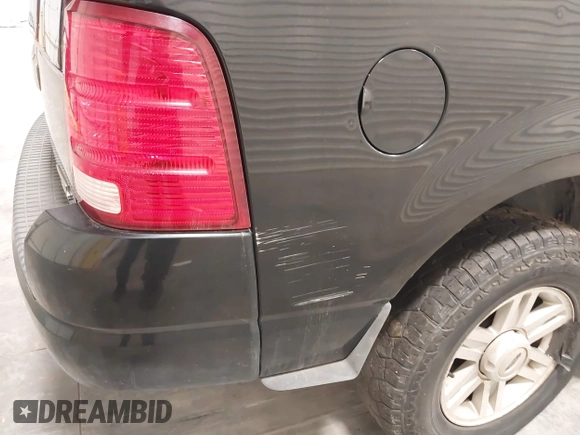 2005 Ford Explorer XLT with VIN 1FMDU73E65ZA53533, listed as a IAAI auction lot 41883334 with 117,657 mi miles and . Bid and sale history available at DreamBid. Image 12.
