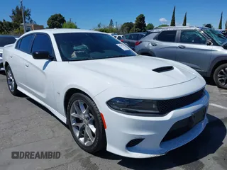 2023 Dodge Charger GT with VIN 2C3CDXHG8PH533221, listed as a IAAI auction lot 41949771 with 8,398 mi miles and . Bid and sale history available at carsss.com. Image 1.