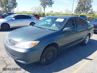 2004 Toyota Camry LE with VIN 4T1BE32K84U371881, listed as a IAAI auction lot 41861322 with 257,149 mi miles. Bid and sale history available at carsss.com. Image 18.