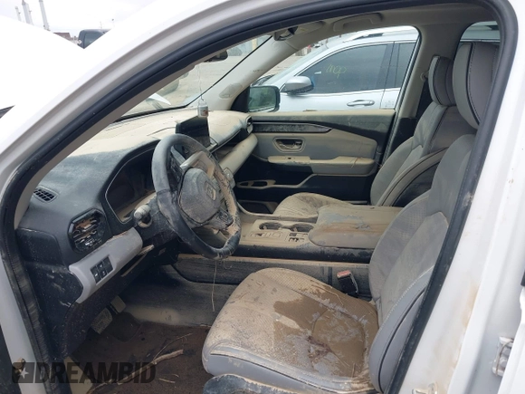 2023 Honda Pilot Elite with VIN 5FNYG1H80PB020937, listed as a IAAI auction lot 42024743 with 20,740 mi miles and . Bid and sale history available at DreamBid. Image 12.