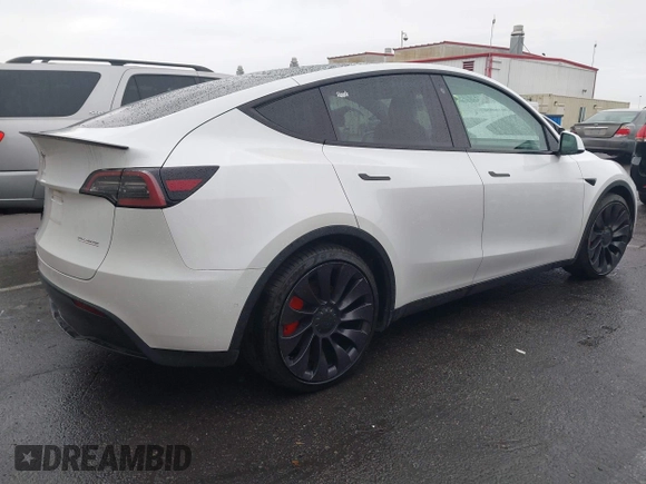 2021 Tesla Model Y Performance with VIN 5YJYGDEF2MF230374, listed as a IAAI auction lot 41708828 with 20,272 mi miles. Bid and sale history available at carsss.com. Image 4.