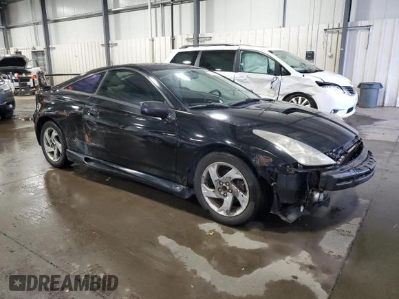 2003 Toyota Celica GT with VIN JTDDR32T130147979, listed as a Copart auction lot 79541304 with 258,540 mi miles and Clean Title. Bid and sale history available at carsss.com. Image 4.