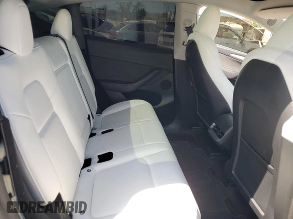 2024 Tesla Model Y Performance z VIN 7SAYGDEF0RF024089, wystawiony jako Copart lot #53981865 z przebiegiem Nie podano mil oraz Szkoda całkowita • Salvage title. Historia ofert i sprzedaży dostępna na DreamBid. Obrazek 10.