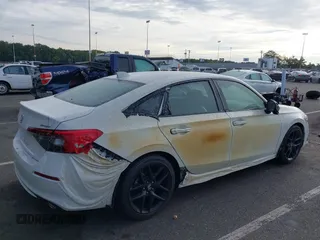 2024 Honda Civic Sport z VIN 2HGFE2F58RH530544, wystawiony jako IAAI lot #40376924 z przebiegiem 12 149 mil mil oraz . Historia ofert i sprzedaży dostępna na DreamBid. Obrazek 6.