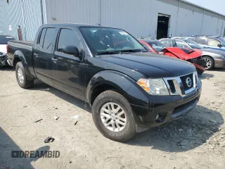 2014 Nissan Frontier SV with VIN 1N6AD0FV7EN736839, listed as a Copart auction lot 58390995 with 111,403 mi miles and Salvage title. Bid and sale history available at DreamBid. Image 4.