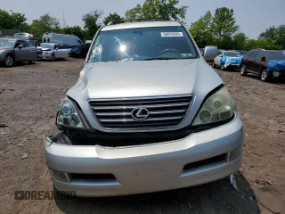 2004 Lexus GX 470 z VIN JTJBT20X440036138, wystawiony jako Copart lot #58859595 z przebiegiem 205 914 mil mil oraz Tytuł czysty. Historia ofert i sprzedaży dostępna na DreamBid. Obrazek 5.