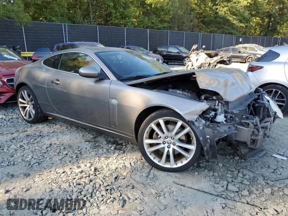 2008 Jaguar XK with VIN SAJWA43B185B26107, listed as a Copart auction lot 74971904 with 108,579 mi miles and Salvage Title. Bid and sale history available at carsss.com. Image 4.
