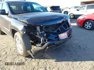 2014 Jeep Grand Cherokee Laredo with VIN 1C4RJEAG3EC218128, listed as a IAAI auction lot 40951611 with 119,596 mi miles and . Bid and sale history available at DreamBid. Image 6.