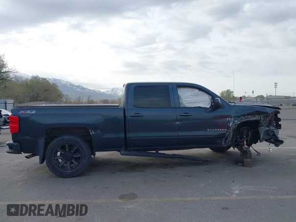 2017 Chevrolet Silverado 1500 LT with VIN 3GCUKREC7HG220780, listed as a IAAI auction lot 41978463 with 131,532 mi miles and . Bid and sale history available at DreamBid. Image 13.
