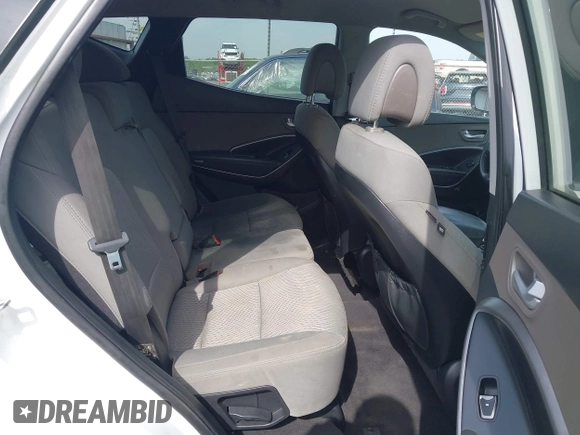 2014 Hyundai Santa Fe z VIN 5XYZTDLB1EG197765, wystawiony jako IAAI lot #41999374 z przebiegiem 172 430 mil mil oraz . Historia ofert i sprzedaży dostępna na DreamBid. Obrazek 8.