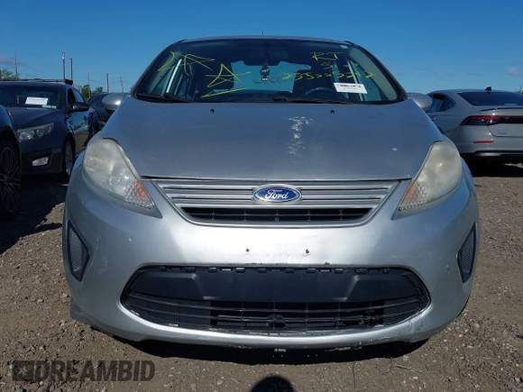 2013 Ford Fiesta S with VIN 3FADP4AJ6DM223132, listed as a IAAI auction lot 42317500 with 104,003 mi miles and . Bid and sale history available at DreamBid. Image 6.