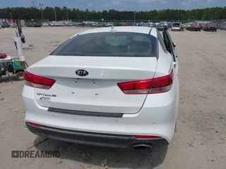 2018 Kia Optima S with VIN 5XXGT4L3XJG244516, listed as a IAAI auction lot 42136414 with 96,000 mi miles and . Bid and sale history available at DreamBid. Image 16.