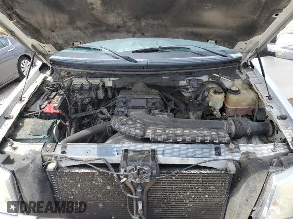 2004 Ford F-150 XLT with VIN 1FTPW14554KC27784, listed as a Copart auction lot 60741985 with 3,163 mi miles and Salvage title. Bid and sale history available at DreamBid. Image 11.