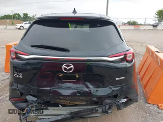 2021 Mazda CX-9 Sport with VIN JM3TCABY6M0522352, listed as a IAAI auction lot 42613136 with 106,167 mi miles and . Bid and sale history available at DreamBid. Image 16.