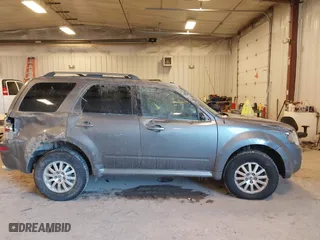 2010 Mercury Mariner Premier with VIN 4M2CN9HGXAKJ11983, listed as a IAAI auction lot 41512060 with 154,971 mi miles. Bid and sale history available at carsss.com. Image 13.