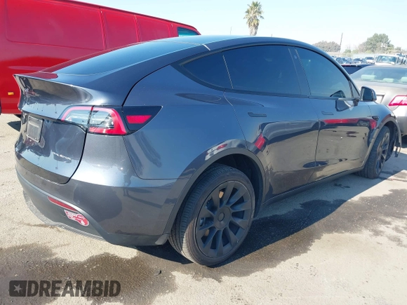 2022 Tesla Model Y Long Range z VIN 7SAYGDEE4NF522698, wystawiony jako IAAI lot #41287885 z przebiegiem 82 306 mil mil oraz . Historia ofert i sprzedaży dostępna na DreamBid. Obrazek 4.