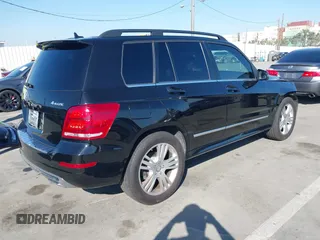 2015 Mercedes-Benz GLK with VIN WDCGG8JB8FG408944, listed as a IAAI auction lot 41615047 with 97,152 mi miles. Bid and sale history available at carsss.com. Image 4.