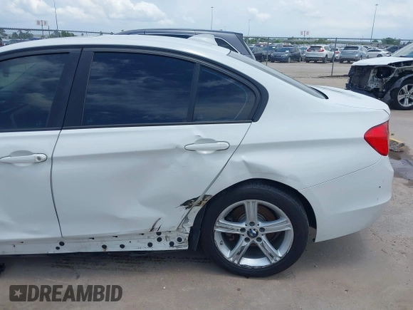 2013 BMW 3 Series 320i with VIN WBA3B1C50DK129576, listed as a IAAI auction lot 42393038 with 160,370 mi miles and . Bid and sale history available at DreamBid. Image 17.