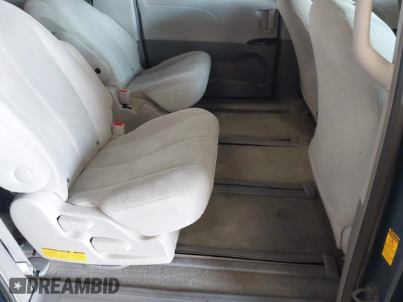 2014 Toyota Sienna L with VIN 5TDZK3DCXES434910, listed as a IAAI auction lot 41731864 with 146,161 mi miles. Bid and sale history available at carsss.com. Image 8.