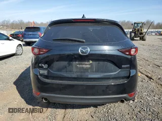 2021 Mazda CX-5 Touring z VIN JM3KFBCM3M1362946, wystawiony jako Copart lot #50325645 z przebiegiem 35 177 mil mil oraz Szkoda całkowita • Salvage title. Historia ofert i sprzedaży dostępna na DreamBid. Obrazek 6.
