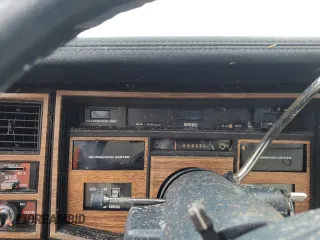 1985 Cadillac Eldorado z VIN 1G6EL5782FE630140, wystawiony jako Copart lot #76367454 z przebiegiem 29 850 mil mil oraz Szkody całkowita. Historia ofert i sprzedaży dostępna na DreamBid. Obrazek 9.