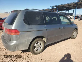 1999 Honda Odyssey EX with VIN 2HKRL1860XH541737, listed as a Copart auction lot 88897965 with 112,164 mi miles and Salvage title. Bid and sale history available at DreamBid. Image 3.