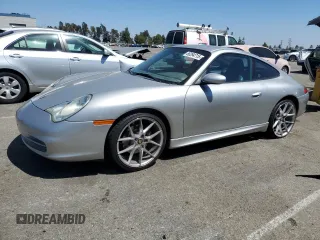 2004 Porsche 911 Carrera with VIN WP0AA29924S620180, listed as a Copart auction lot 66294715 with 67,309 mi miles and Salvage title. Bid and sale history available at DreamBid. Image 1.