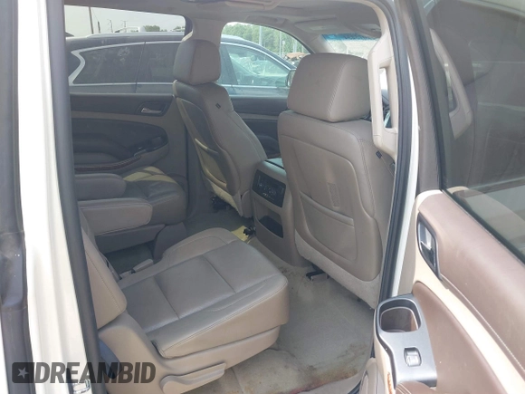 2015 Chevrolet Suburban LTZ with VIN 1GNSCKKC5FR740352, listed as a IAAI auction lot 39075234 with 112,945 mi miles and . Bid and sale history available at DreamBid. Image 8.