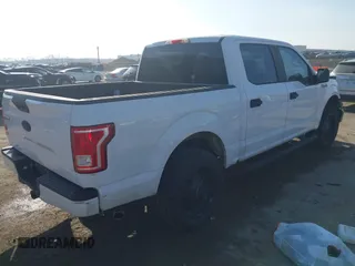2017 Ford F-150 XL with VIN 1FTEW1CF8HKE13441, listed as a IAAI auction lot 41797041 with 185,482 mi miles and . Bid and sale history available at carsss.com. Image 4.