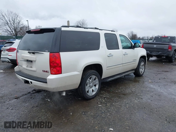 2012 GMC Yukon XL SLT with VIN 1GKS2KE77CR205341, listed as a IAAI auction lot 41565367 with 165,500 mi miles. Bid and sale history available at carsss.com. Image 4.