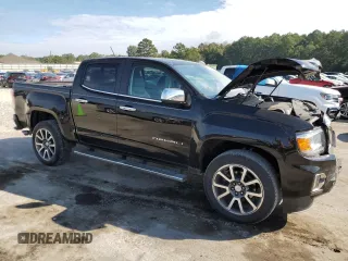 2021 GMC Canyon 2WD Denali with VIN 1GTG5EEN3M1192709, listed as a Copart auction lot 73865224 with 90,575 mi miles and Salvage Title. Bid and sale history available at carsss.com. Image 4.
