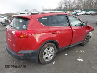 2015 Toyota RAV4 LE with VIN JTMBFREV0FD125632, listed as a IAAI auction lot 41886454 with 164,409 mi miles. Bid and sale history available at carsss.com. Image 4.