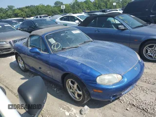 1999 Mazda MX-5 Miata with VIN JM1NB353XX0134898, listed as a Copart auction lot 63429475 with 140,595 mi miles and Clean title. Bid and sale history available at DreamBid. Image 4.