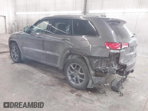 2021 Jeep Grand Cherokee 80th Anniversary z VIN 1C4RJFBG9MC580645, wystawiony jako IAAI lot #41398269 z przebiegiem 79 057 mil mil oraz . Historia ofert i sprzedaży dostępna na DreamBid. Obrazek 3.