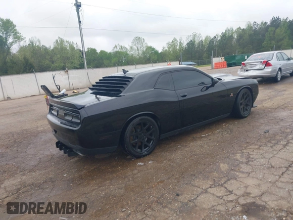 2016 Dodge Challenger R/T Scat Pack z VIN 2C3CDZFJ4GH118973, wystawiony jako IAAI lot #41960654 z przebiegiem 180 315 mil mil oraz . Historia ofert i sprzedaży dostępna na DreamBid. Obrazek 4.