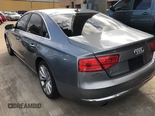 2012 Audi A8 с VIN WAUAVAFD2CN028862, выставлен на аукционе Copart как лот 80295204 с пробегом 162 752 миль миль и Чистый • Clean title. История ставок и продаж доступна на DreamBid. Изображение 3.