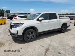 2021 Honda Ridgeline RTL-E with VIN 5FPYK3F71MB021439, listed as a Copart auction lot 67190935 with Not provided miles and Clean title. Bid and sale history available at DreamBid. Image 1.