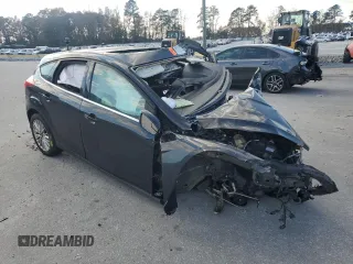 2017 Ford Focus Titanium z VIN 1FADP3N23HL291408, wystawiony jako Copart lot #83876124 z przebiegiem Nie podano mil oraz Szkoda całkowita • Salvage title. Historia ofert i sprzedaży dostępna na DreamBid. Obrazek 4.
