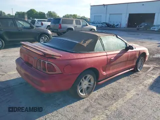 1998 Ford Mustang GT with VIN 1FAFP45X3WF201910, listed as a IAAI auction lot 41882210 with 96,415 mi miles. Bid and sale history available at carsss.com. Image 4.