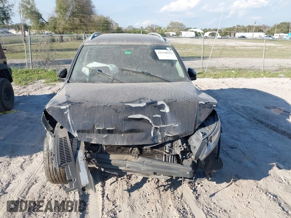 2012 Volkswagen Tiguan SE with VIN WVGAV7AX8CW565863, listed as a IAAI auction lot 41528643 with 122,569 mi miles and . Bid and sale history available at DreamBid. Image 6.