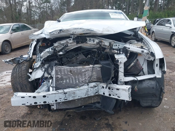 2016 Chrysler 300 S z VIN 2C3CCAGG5GH270347, wystawiony jako IAAI lot #41487152 z przebiegiem 104 041 mil mil oraz . Historia ofert i sprzedaży dostępna na DreamBid. Obrazek 13.