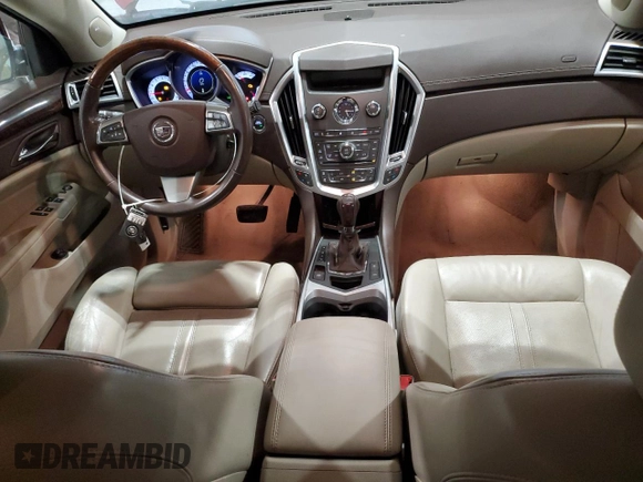 2010 Cadillac SRX Premium Collection z VIN 3GYFNFEY1AS647556, wystawiony jako Copart lot #42717615 z przebiegiem 184 749 mil mil oraz Szkoda całkowita • Salvage title. Historia ofert i sprzedaży dostępna na DreamBid. Obrazek 8.